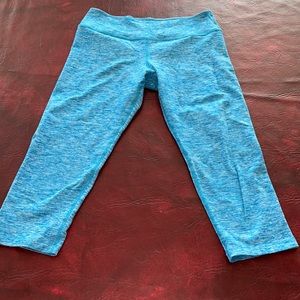 Woman’s blue stretch yoga work out leggings.